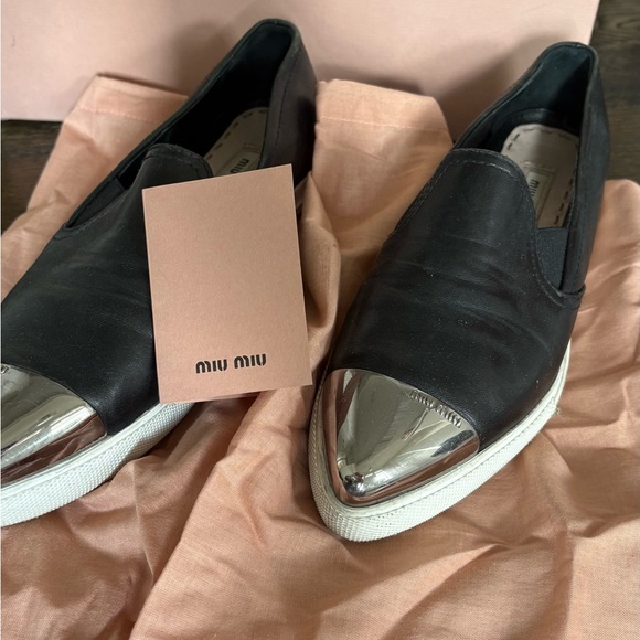 Miu Miu Shoes - Miu Miu Black Slip-On Sneakers with Silver Cap Toe
